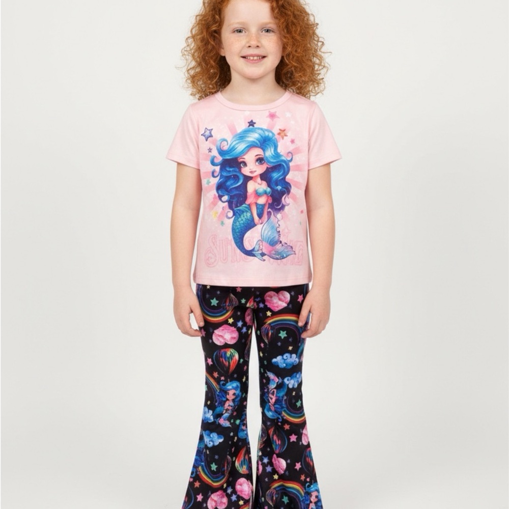 Pink mermaid graphic t-shirt and matching flared pants.